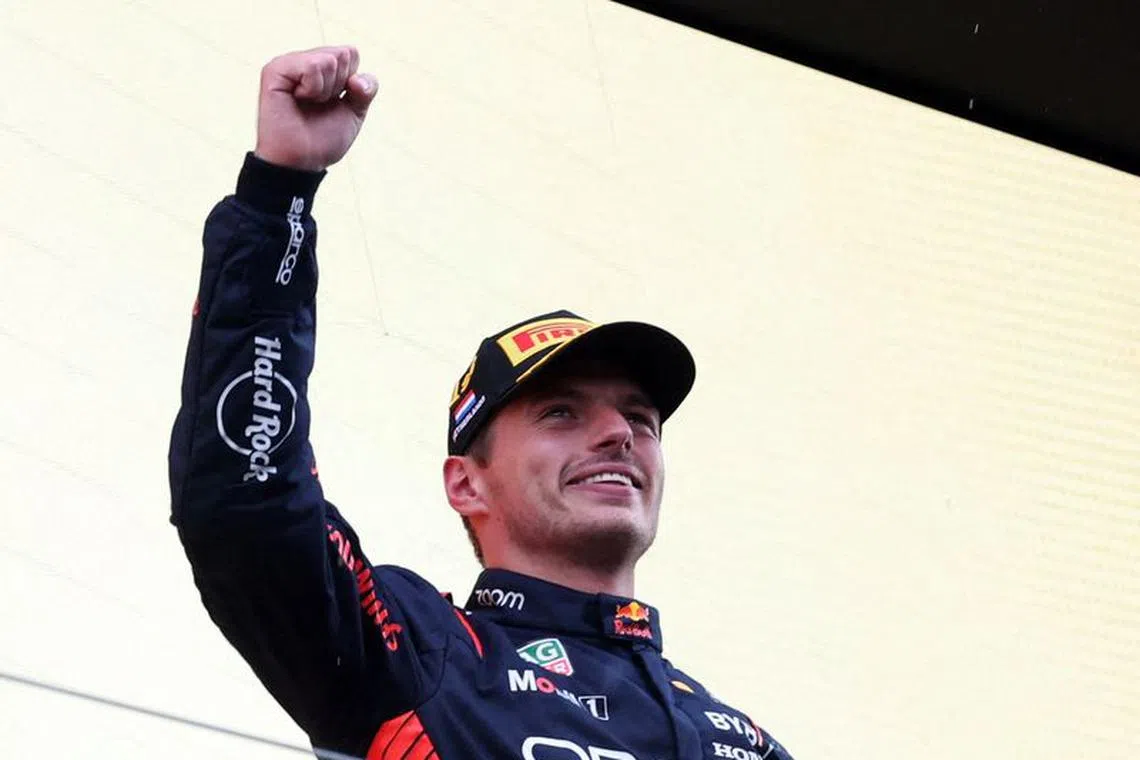FILE PHOTO: Formula One F1 - Dutch Grand Prix - Circuit Zandvoort, Zandvoort, Netherlands - August 27, 2023 Red Bull's Max Verstappen celebrates on the podium after winning the Dutch Grand Prix REUTERS/Stephanie Lecocq/File Photo