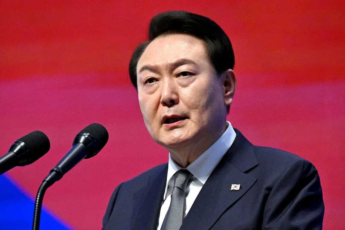 The suspect uploaded a post to a message board with a picture of a pistol, along with a threat to kill South Korean President Yoon Suk-yeol.