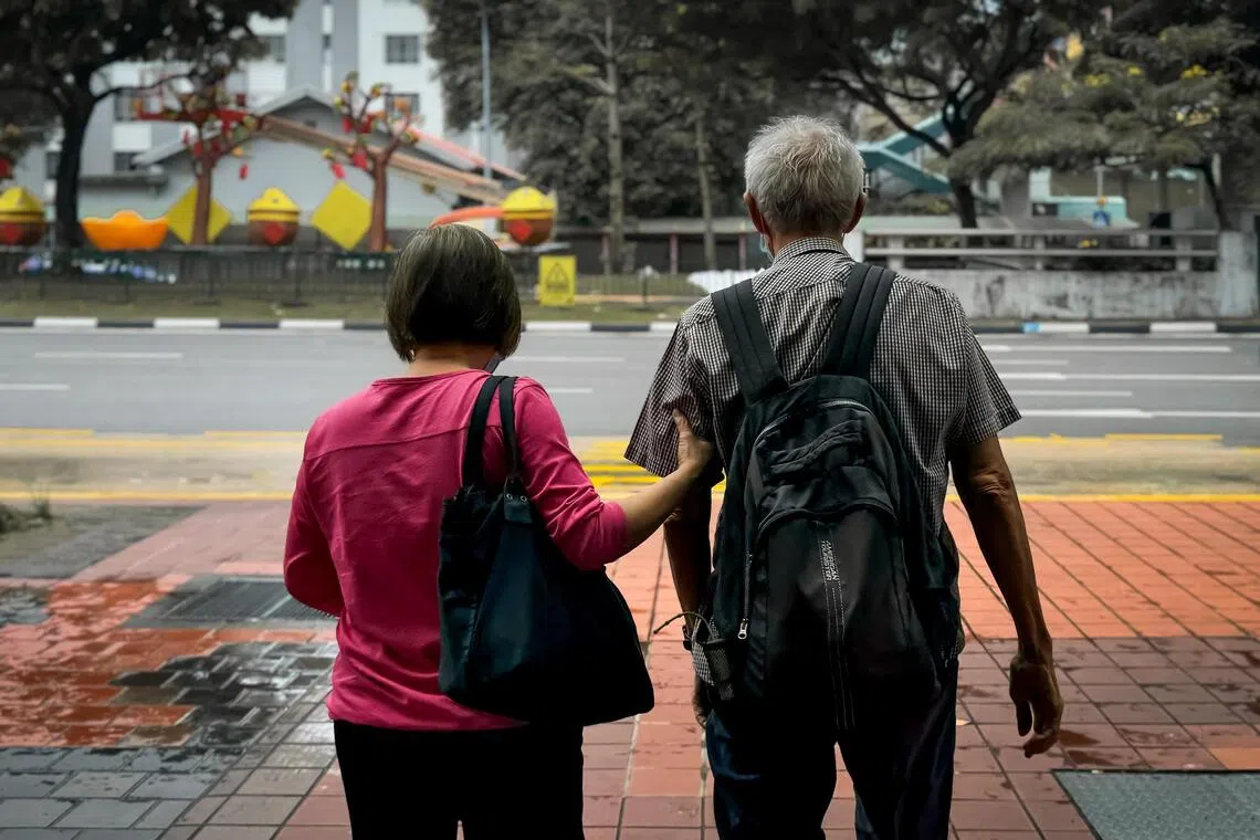 PIXGENERIC 
Generic Pictures. 

Elderly waiting for their bus at a bus stop on New Bridge Road, Jan 17, 2024. 

Old people, bus stop, Lunar New Year, CNY, LNY, dragon year,  tradition, traditional, culture, cultural, banner, poster, elderly, shoppers, red.