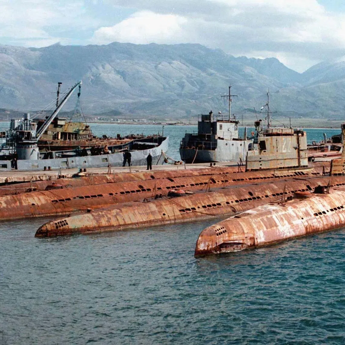 FILE PHOTO: Albanian submarines demolished during the civil unrest in March 1997, are shown at the Pashaliman naval base in Vlore, some 170 km from Tirana, February 28, 2001. REUTERS//File Photo