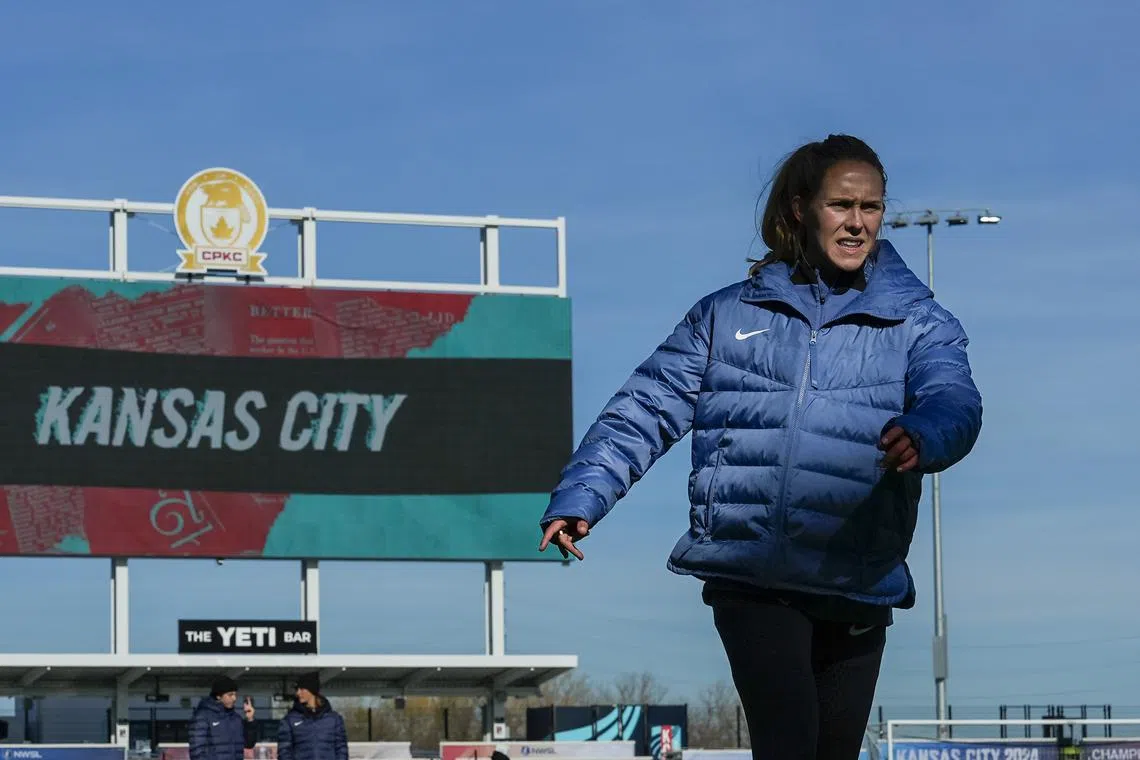 FILE PHOTO: Nov 22, 2024; Kansas City, Missouri, USA; Washington Spirit goalkeeper Kaylie Collins (31) warms up during a training session ahead of the 2024 NWSL Championship against the Orlando Pride at CPKC Stadium. Mandatory Credit: Jay Biggerstaff-Imagn Images/File Photo