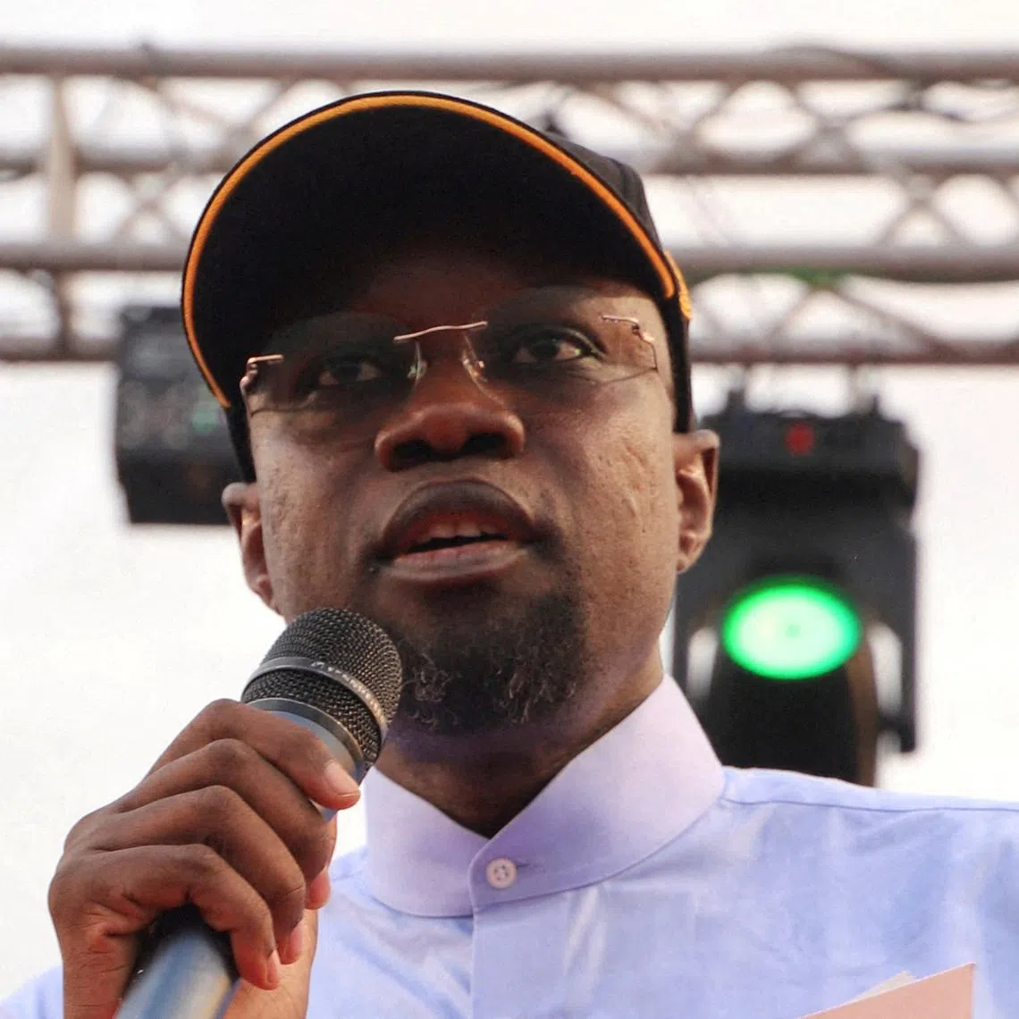 FILE PHOTO: Senegal's Prime Minister Ousmane Sonko of the ruling party PASTEF (African Patriots of Senegal for Work, Ethics and Fraternity) speaks during a political rally in Dakar, Senegal, November 8, 2025. REUTERS/Anait Miridzhanian/File Photo