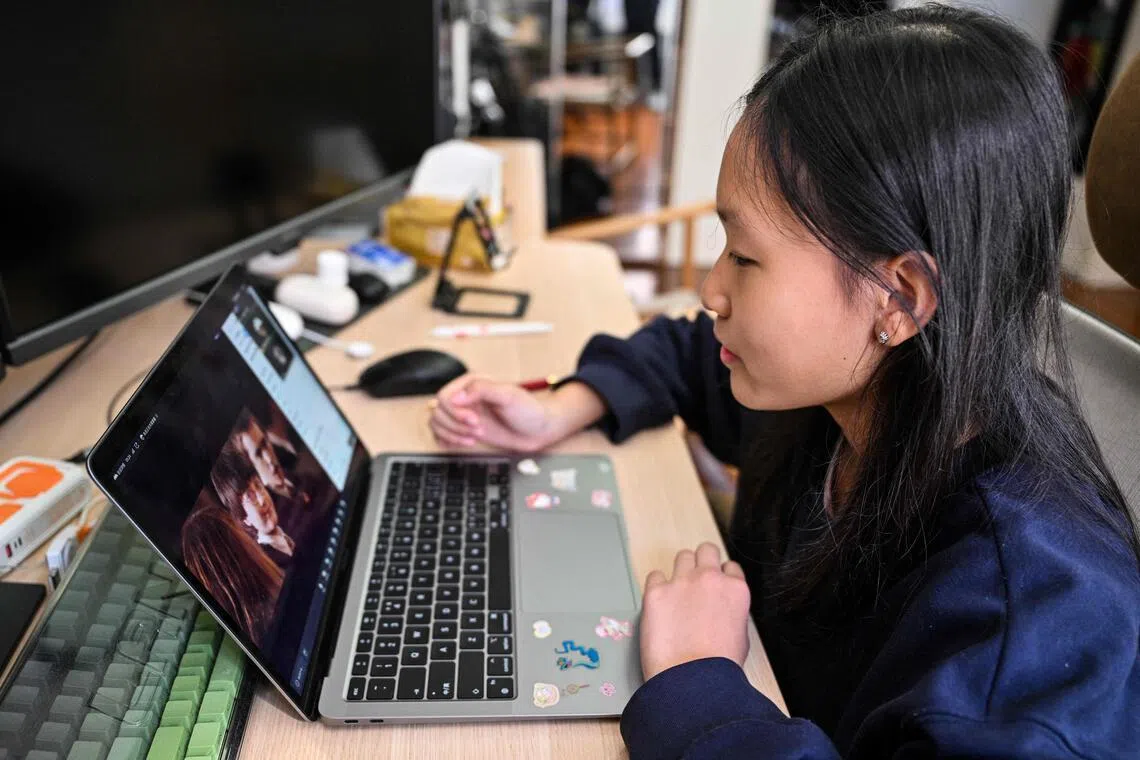 Estella, 14, a homeschooled student, attends a Spanish class in her home in Shanghai.