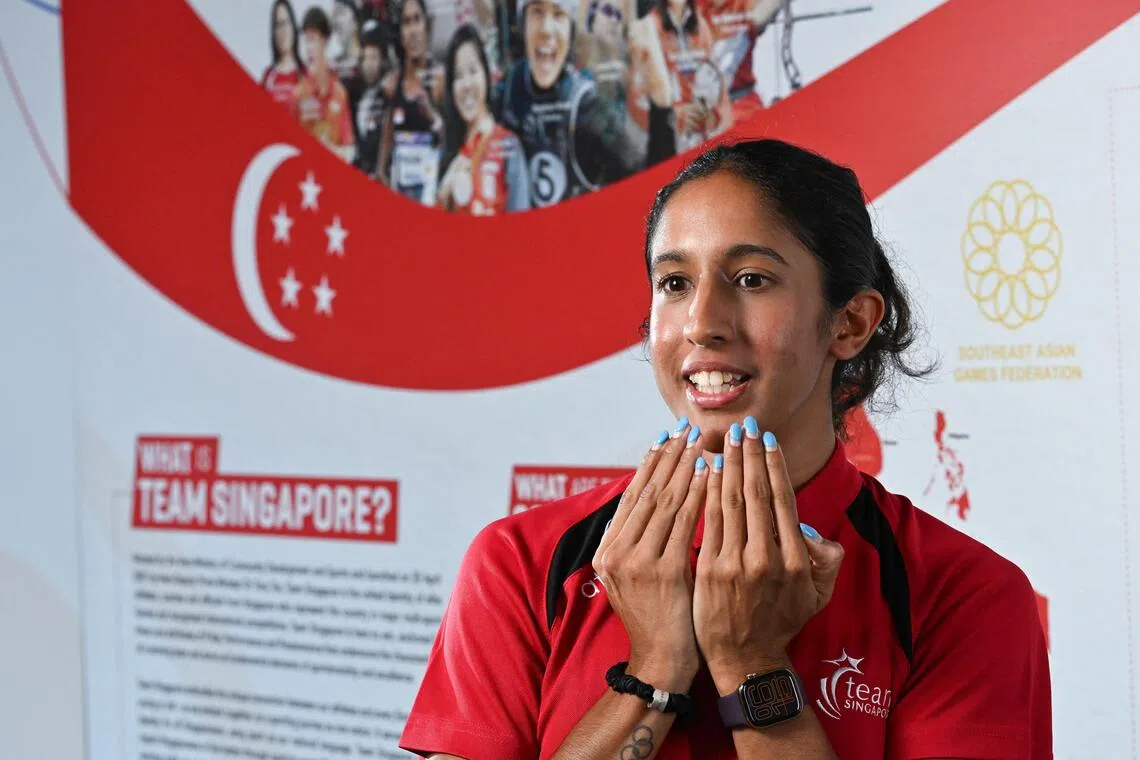 ST20251015-202515200709-Lim Yaohui-Melvyn Teoh-mtschool15/
Team SG athlete Shanti Pereira (Athletics) doing a media doorstop during launch of the School Sports Fiesta, a pilot programme bringing students from different backgrounds together through sports, at Edgefield Secondary School on Oct 15, 2025.
This event also marks the kick-off of Team Singapore’s One Team, One Dream Campaign, which aims to rally Singaporeans behind Team Singapore athletes ahead of the upcoming SEA Games (9–20 December 2025) and ASEAN Para Games (20–26 January 2026) in Thailand. 
(ST PHOTO: LIM YAOHUI)