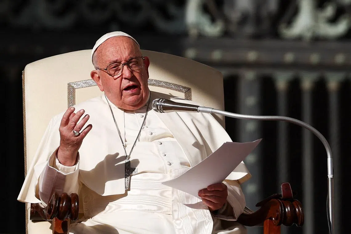 Pope Francis speaks during the weekly general audience in St. Peter's Square, at the Vatican October 30, 2024. REUTERS/Guglielmo Mangiapane/File Photo