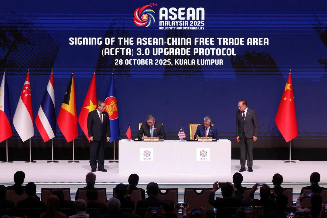 ASEAN Chair and Malaysia's Prime Minister, Anwar Ibrahim and Chinese Premier Li Qiang witness the signing of the ASEAN-China Free Trade Area 3.0 Upgrade.