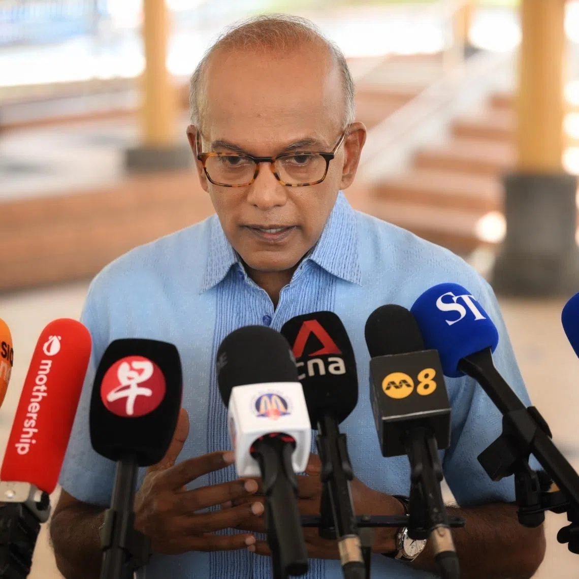 Coordinating Minister for National Security and Minister for Home Affairs K. Shanmugam speaking to the media on the sidelines of a community event in Yishun on April 4.