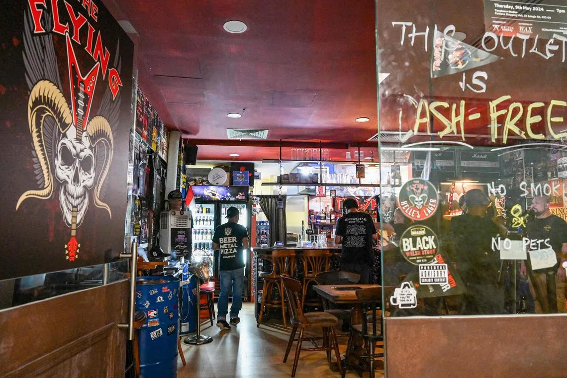 Tucked away in the basement of The Adelphi is The Flying V, Singapore's only heavy metal bar, where music fans brush shoulder-to-shoulder with global celebrities from the noisy genre. 