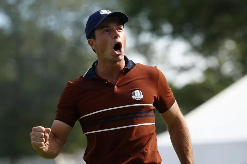 Viktor Hovland reacts after winning the 14th hole during the morning foursomes matches of the 2025 Ryder Cup on Sept 27, 2025.
