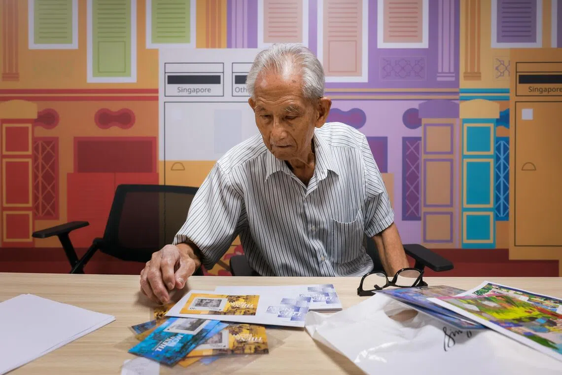 Stamp collector Tan Kan Buey with his new lenticular stamps on Oct 9.