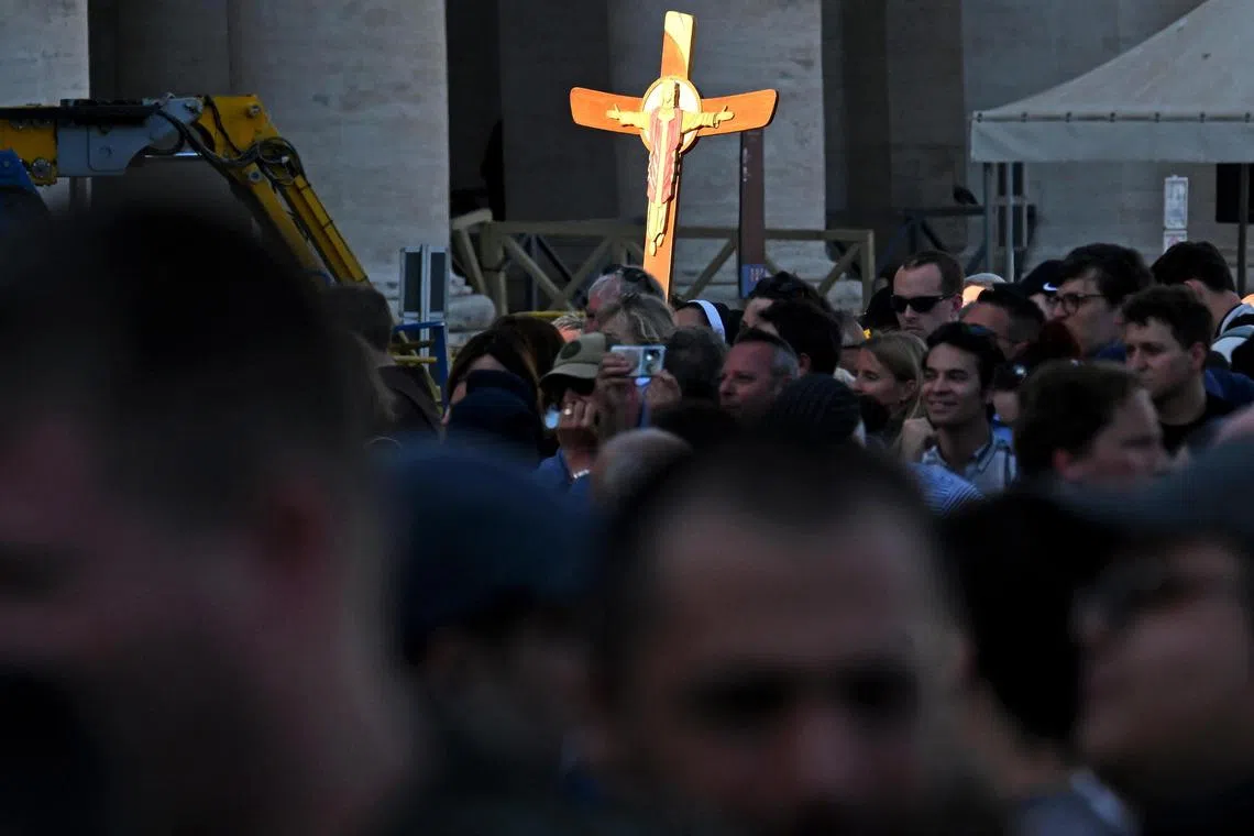 The faithful gathered in St. Peter's Square on the second day of the conclave in Vatican City on May 8.