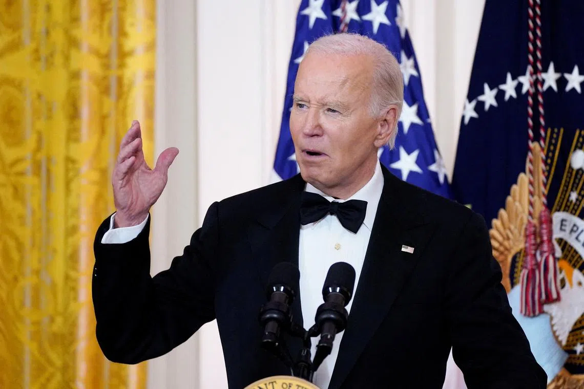 U.S. President Joe Biden hosts Kennedy Center honorees in the East Room at the White House in Washington, U.S., December 8, 2024. REUTERS/Ken Cedeno/File Photo