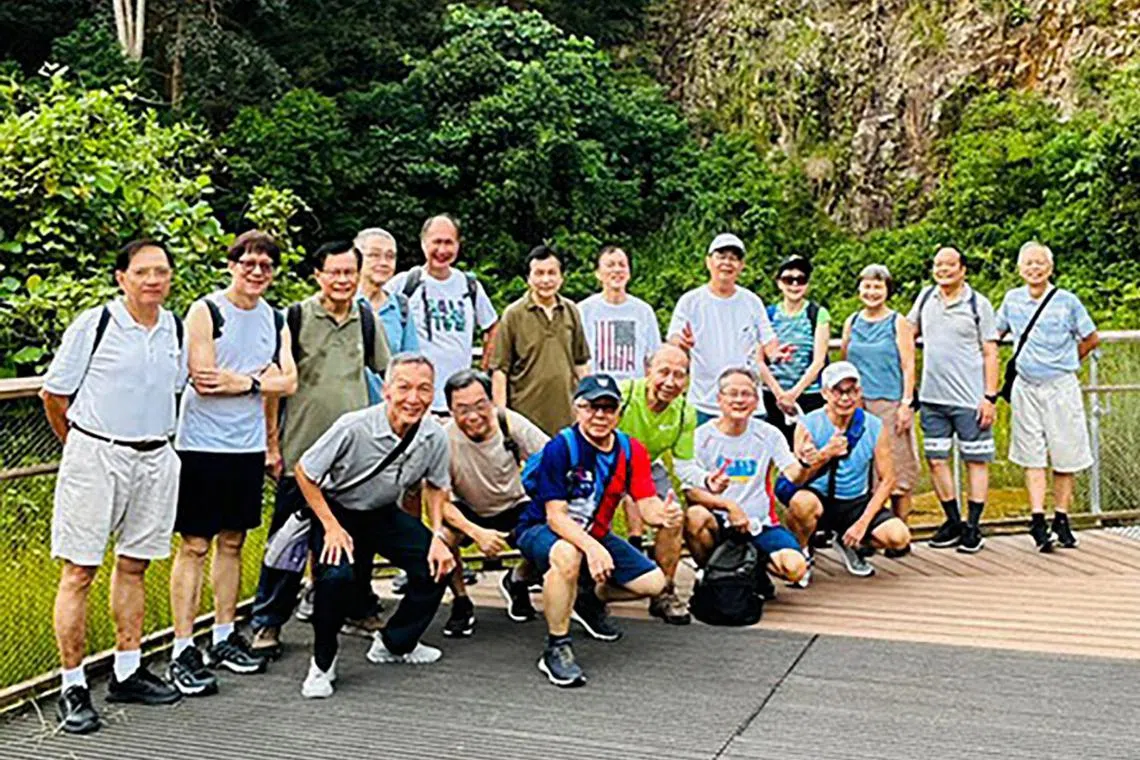 Mr Frederick Lim (front row, first from right) with his friends during a nature walk at Rifle Range park on June 29.