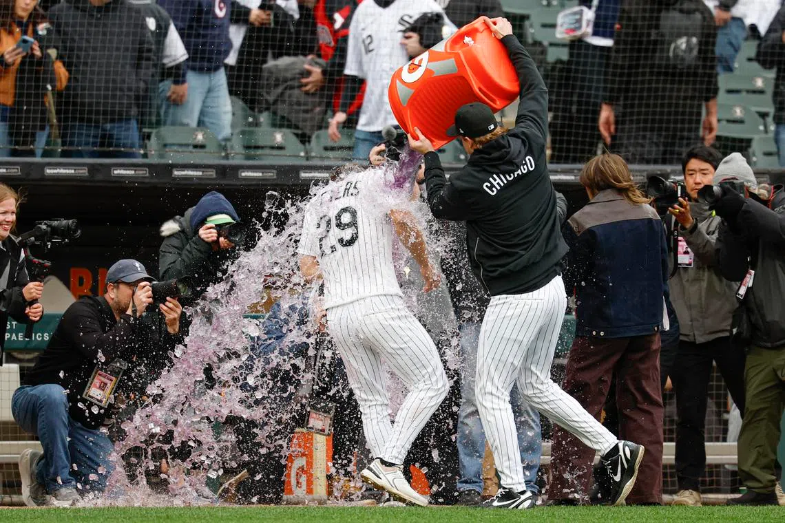 Chicago White Sox right fielder Tristan Peters being doused with Gatorade to celebrate his walk-off RBI single against the Toronto Blue Jays on April 3.