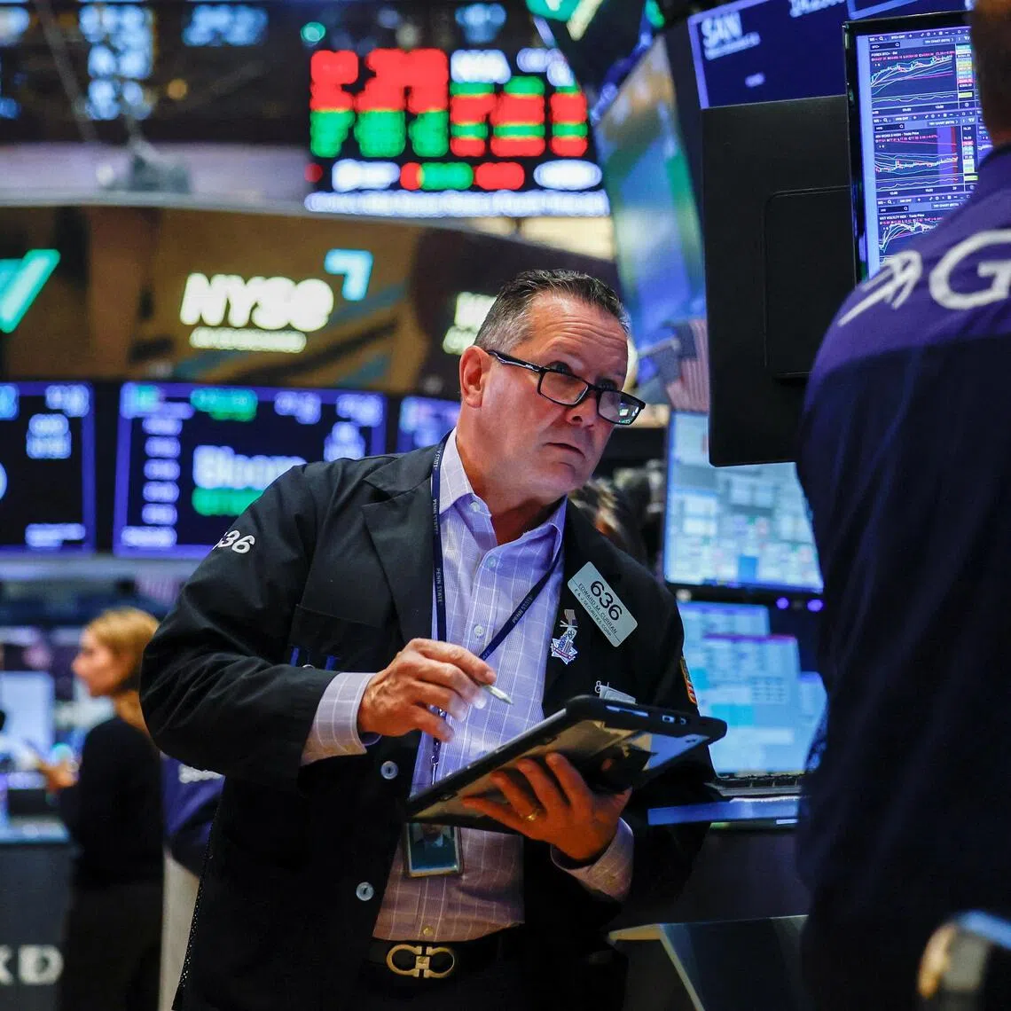 Traders working on the floor of the New York Stock Exchange, in New York City, on Sept 29.