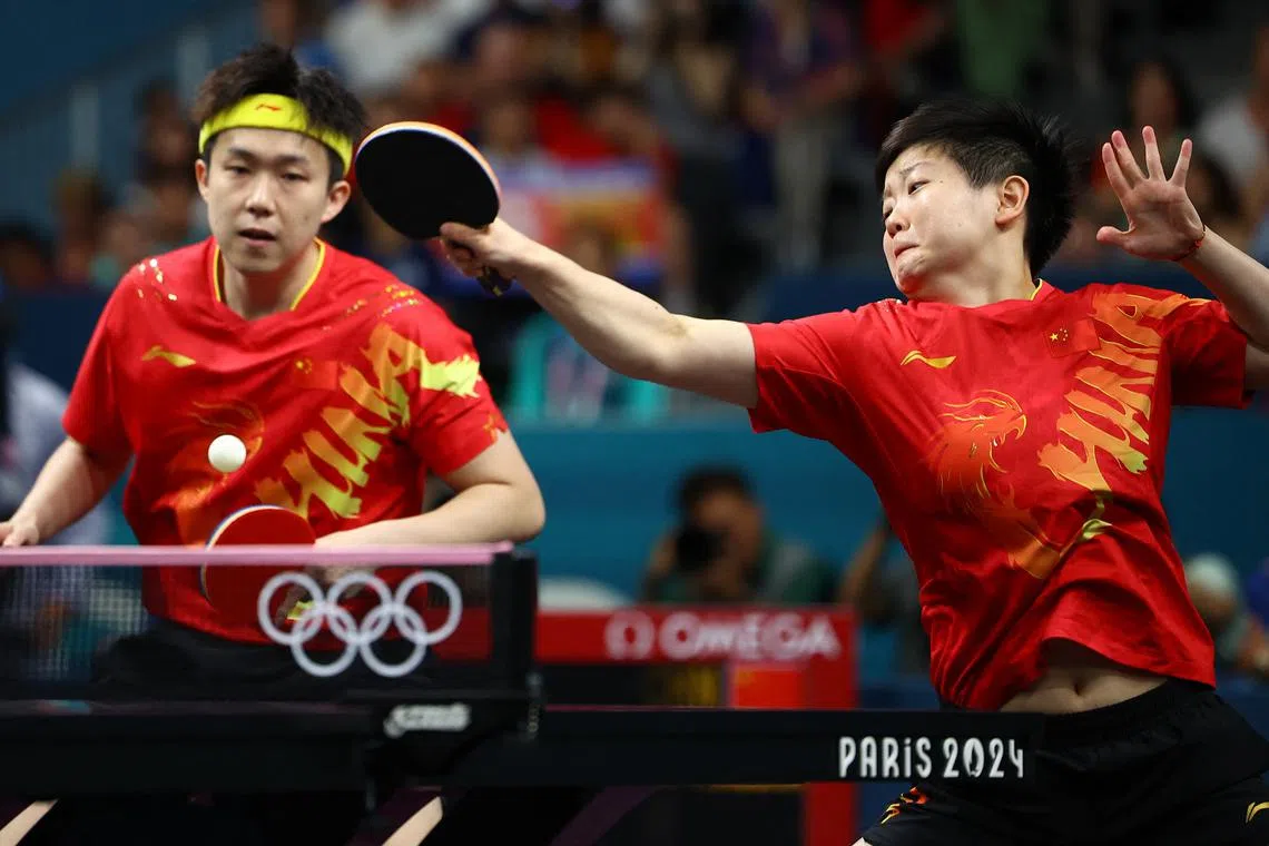 table-tennis-wang-and-sun-win-mixed-doubles-gold-after-china-s-tokyo