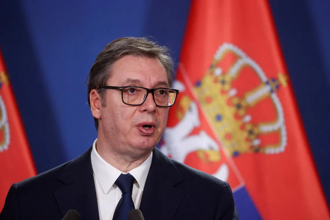 FILE PHOTO: Serbian President Aleksandar Vucic gives a statement next to Hungarian Prime Minister Viktor Orban (not pictured) after the countries' bilateral committee for strategic cooperation meeting in Budapest, Hungary, November 14, 2024. REUTERS/Bernadett Szabo/File Photo