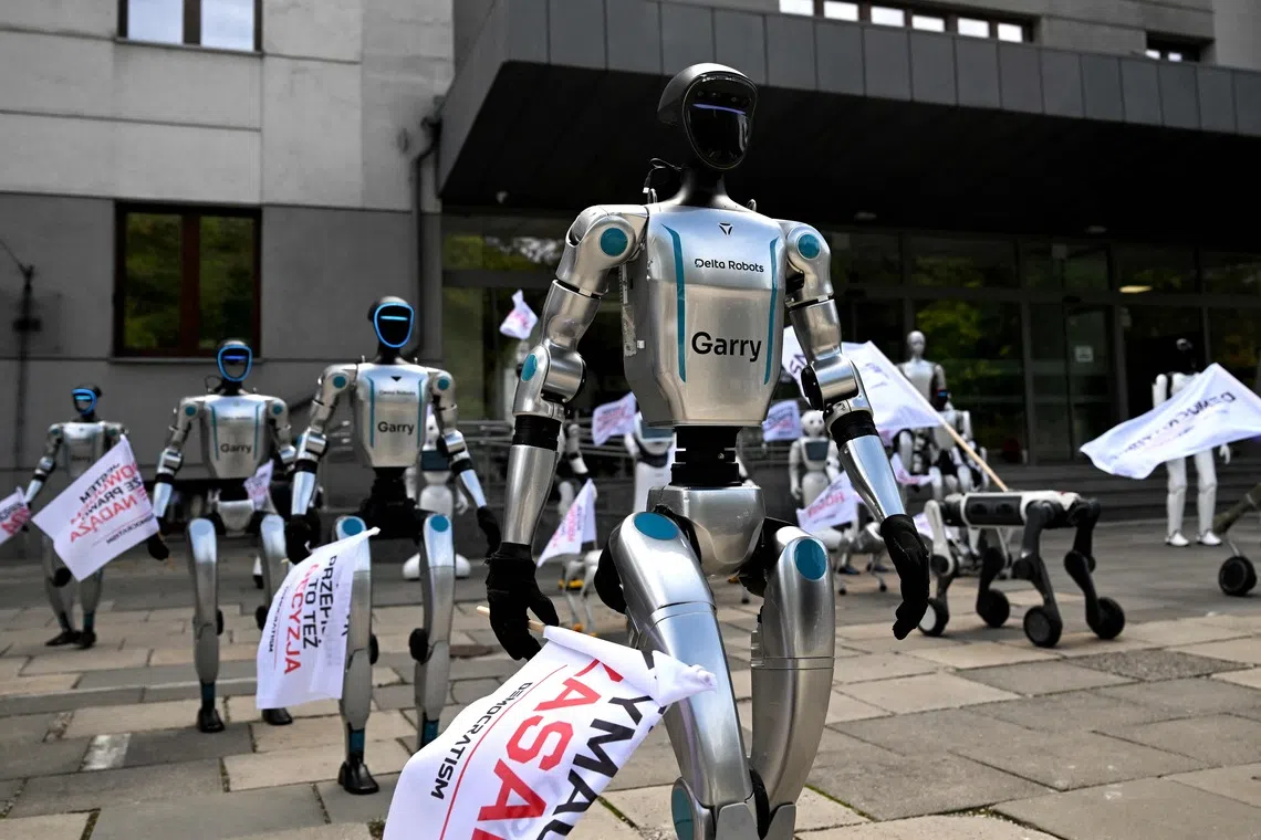 Robots take to Warsaw streets to protest rampant AI
