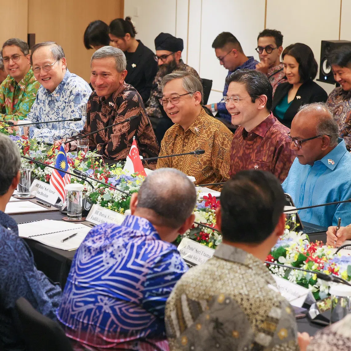 Prime Minister Lawrence Wong and his Malaysian counterpart Anwar Ibrahim, along with the delegations from Singapore and Malaysia, were dressed in batik at the 12th Singapore-Malaysia Leaders’ Retreat on Dec 4.