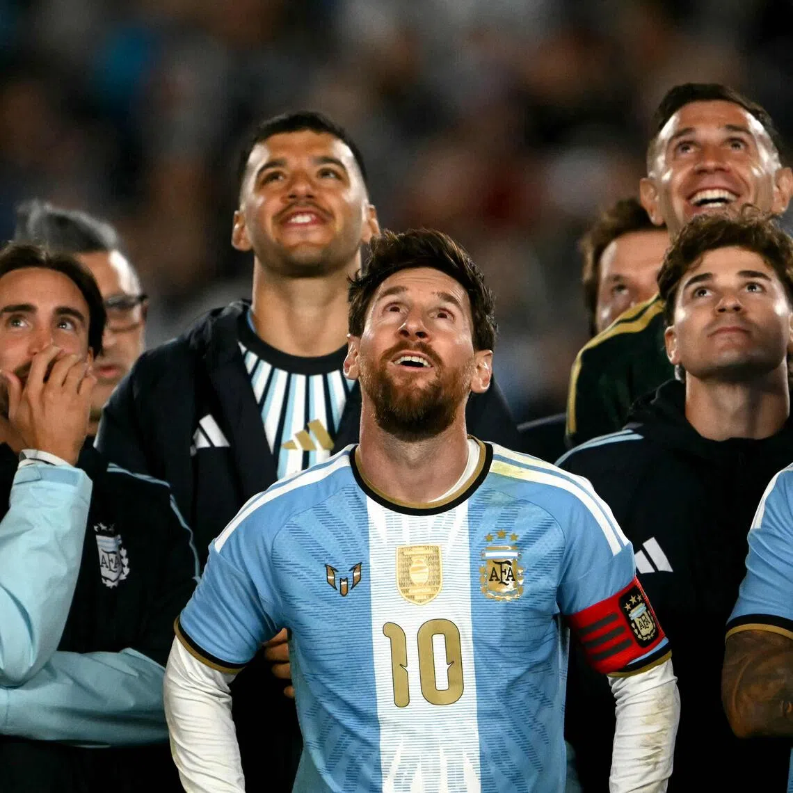 Argentina’s Lionel Messi (centre) was treated to an emotional farewell after his final match for Argentina, a friendly against Benin in Buenos Aires on Oct 6.