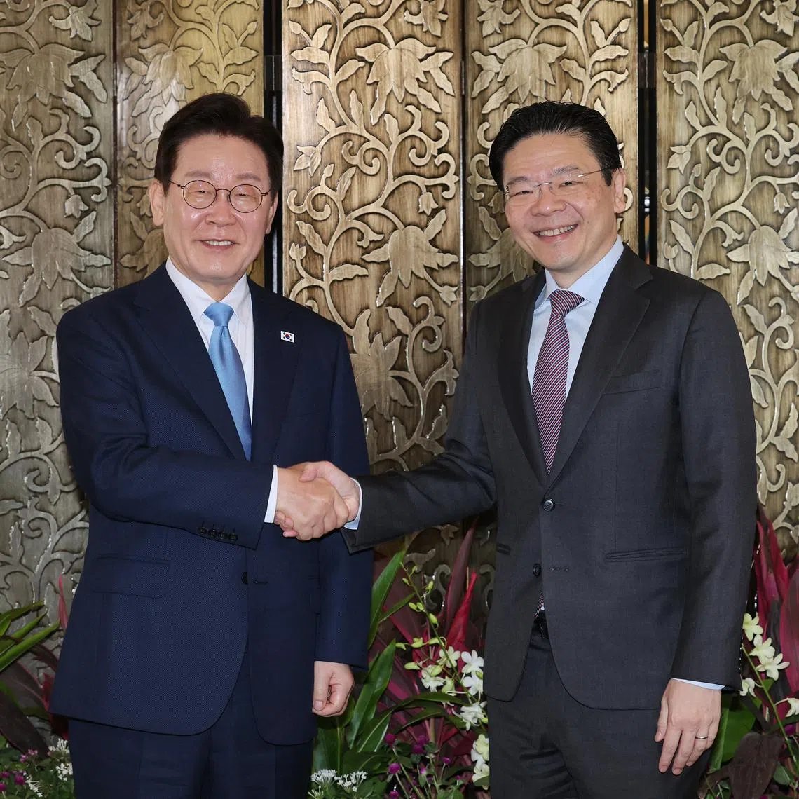 Prime Minister Lawrence Wong (right) meeting South Korean President Lee Jae Myung on March 2.
