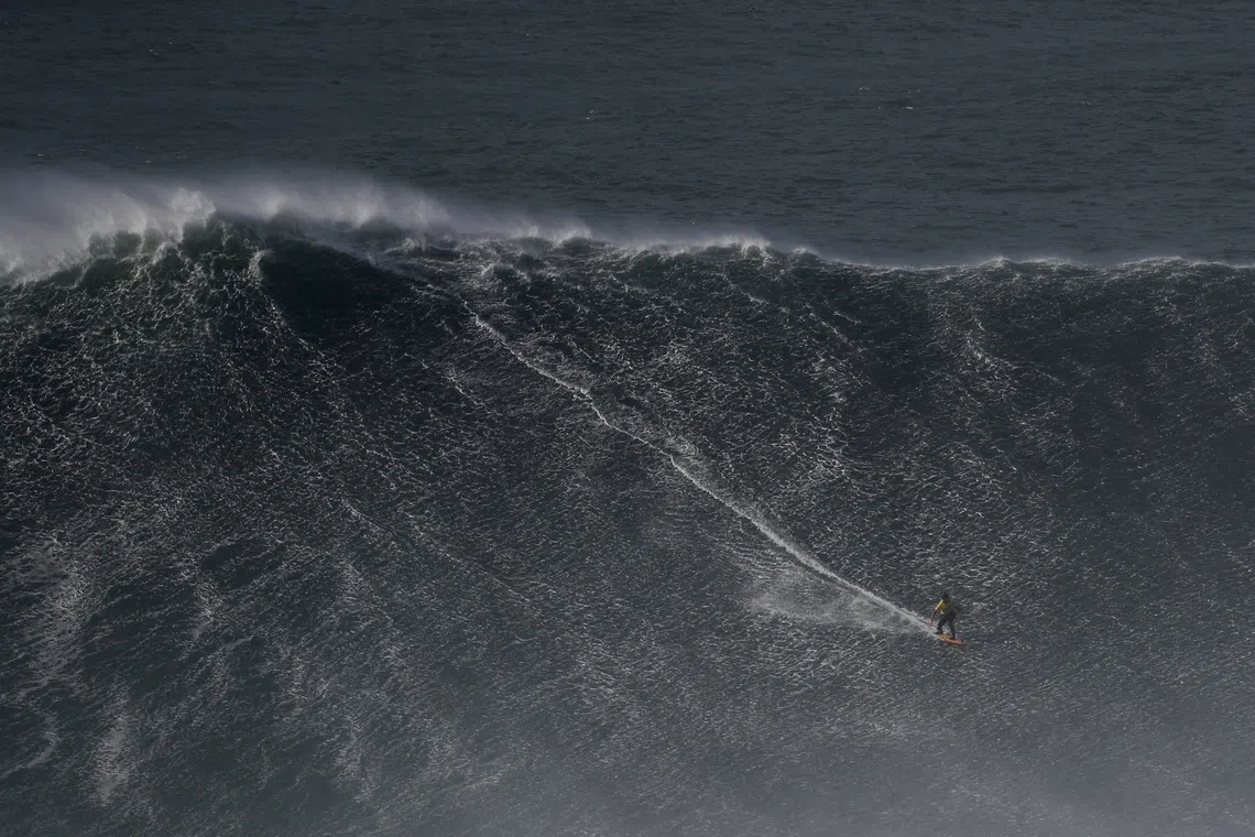 Dupont, Chianca claim big wave titles in giant Nazare surf