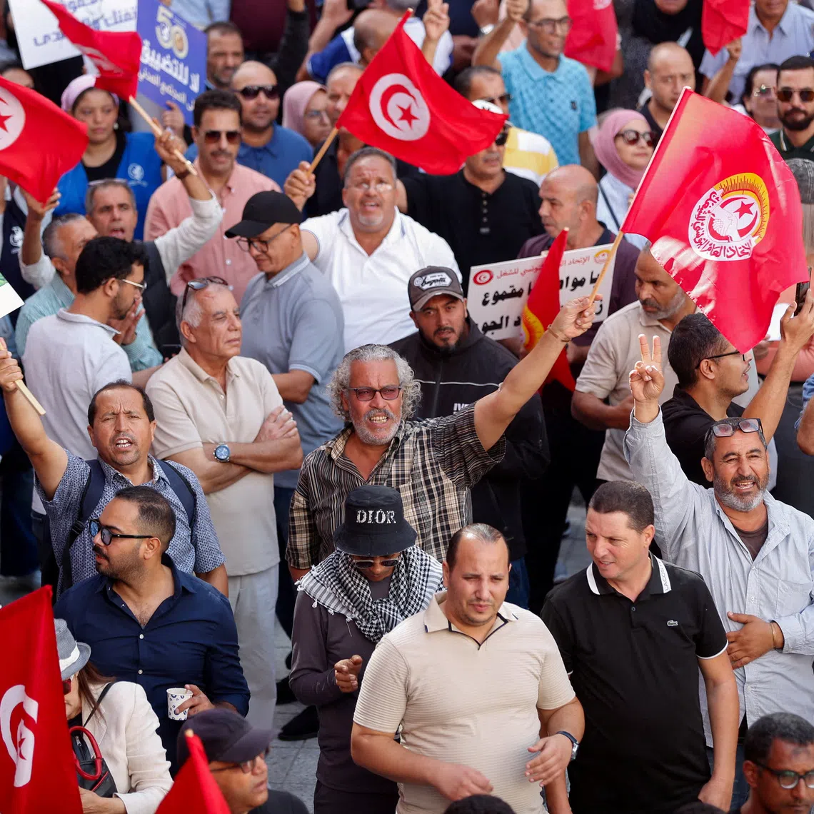 FILE PHOTO: Demonstrators take part in a protest led by the Tunisian General Labour Union (UGTT), demanding the restoration of democracy and denouncing mounting restrictions on freedoms, intensifying pressure on President Kais Saied amid a deepening economic and political crisis, in Tunis, Tunisia, October 17, 2026. REUTERS/Zoubeir Souissi/File Photo