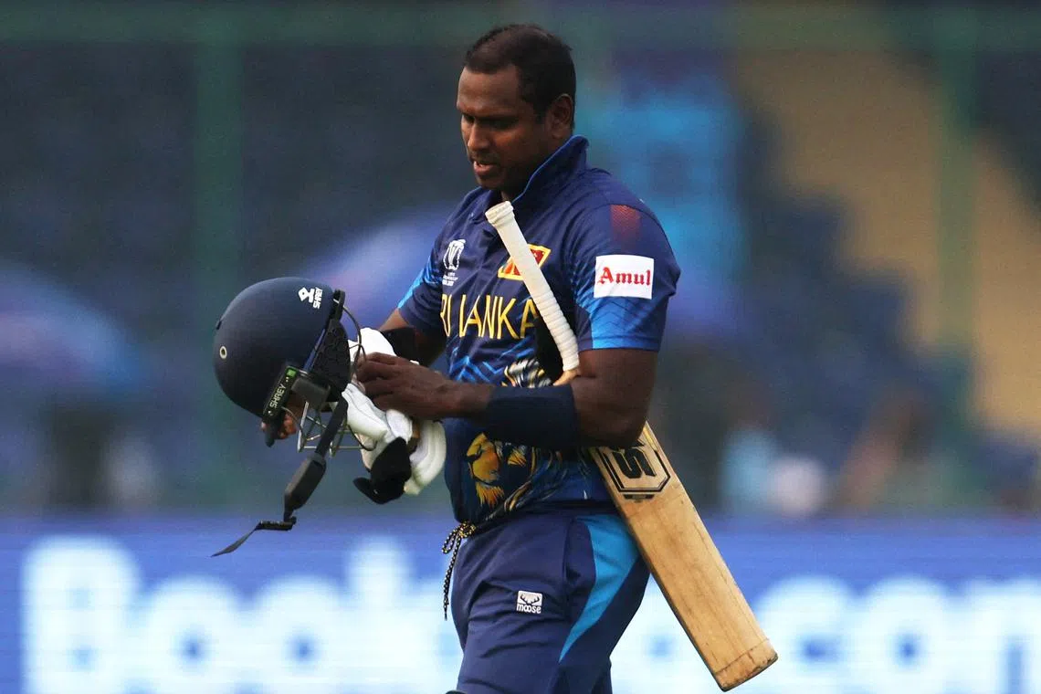 FILE PHOTO: Cricket - ICC Cricket World Cup 2023 - Bangladesh v Sri Lanka - Arun Jaitley Stadium, New Delhi, India - November 6, 2023 Sri Lanka's Angelo Mathews walks after losing his wicket due to time out REUTERS/Anushree Fadnavis