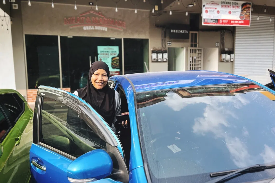 Larkin resident Norhayatie Syawal, 41, said the new parking gantry system at Jalan Geroda offers more ease for residents to shop and dine as previously Malaysians working in Singapore would hog the parking lots there.