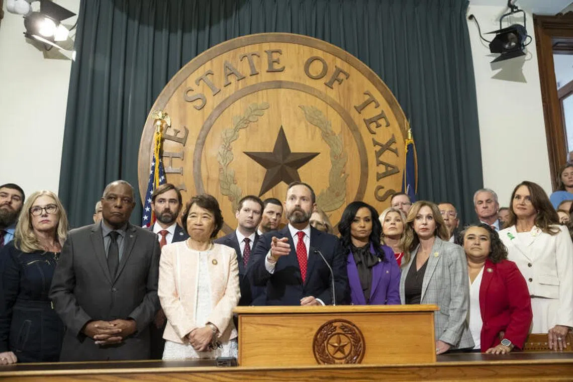 Speaker of the Texas House of Representatives Dustin Burrows takes questions at a news conference in Austin, on Aug 4, 2025.