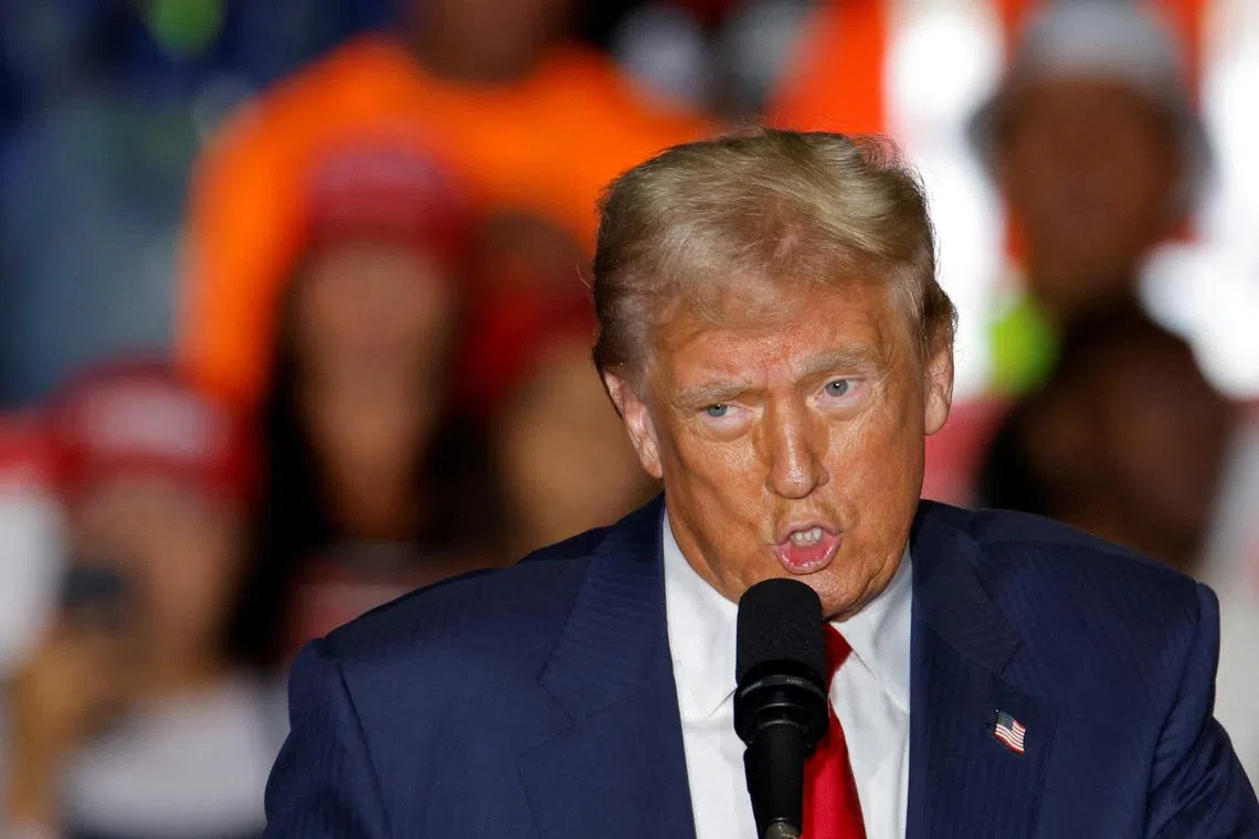Republican presidential nominee former U.S. President Donald Trump speaks during a rally in Greensboro Coliseum, in Greensboro, North Carolina, U.S. October 22, 2024. REUTERS/Jonathan Drake/ File Photo