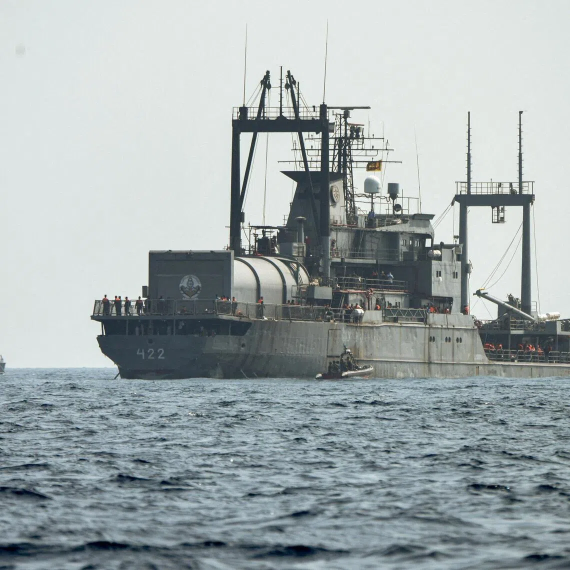 FILE PHOTO: A Sri Lanka Navy vessel approaches an Iranian Navy vessel IRIS Bushehr (422) during a rescue operation, a day after the crew of a distressed Iranian military ship, IRIS Dena, were assisted in waters south of Sri Lanka, off the coast of Colombo, Sri Lanka, March 5, 2026. Sri Lanka Navy/Handout via REUTERS THIS IMAGE HAS BEEN SUPPLIED BY A THIRD PARTY/File Photo   REFILE - ADDING THE NAME OF THE IRANIAN VESSEL