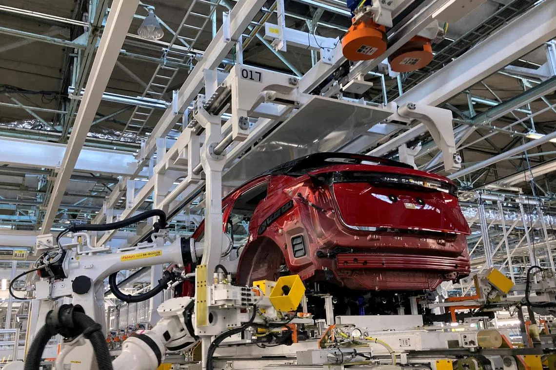 FILE PHOTO: Nissan Motor's Universal Powertrain Mounting System with a two-layer pallet structure, compatible with EV, e-POWER (HV) and gasoline vehicles is pictured in Kawachi-gun, in Tochigi prefecture, Japan October 8, 2021. REUTERS/Maki Shiraki/File Photo