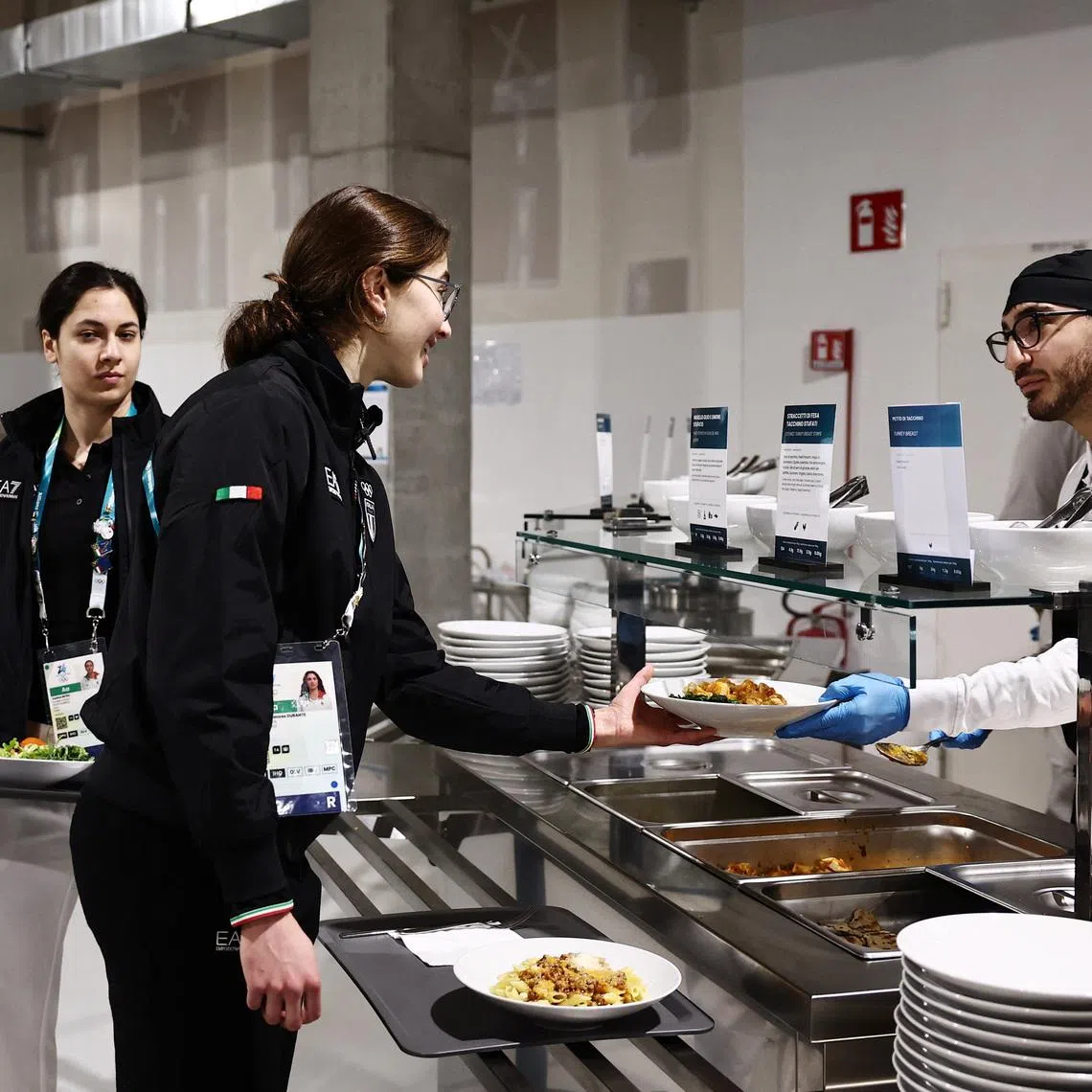General view of team Italy athletes in the cafeteria at the Olympic and Paralympic Athletes' Village.