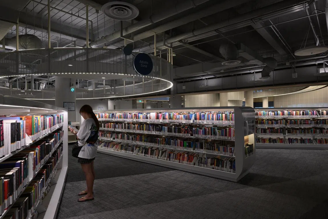wlpunggol/ST20240406_202443559610/Ng Sor Luan/Punggol regional library turns one in April. It is the largest public library in Singapore, and includes many unique features to enhance accessibility to those with disabilities such as wide space and low shelves between aisles for wheelchair users. Photos taken on April 6, 2024.