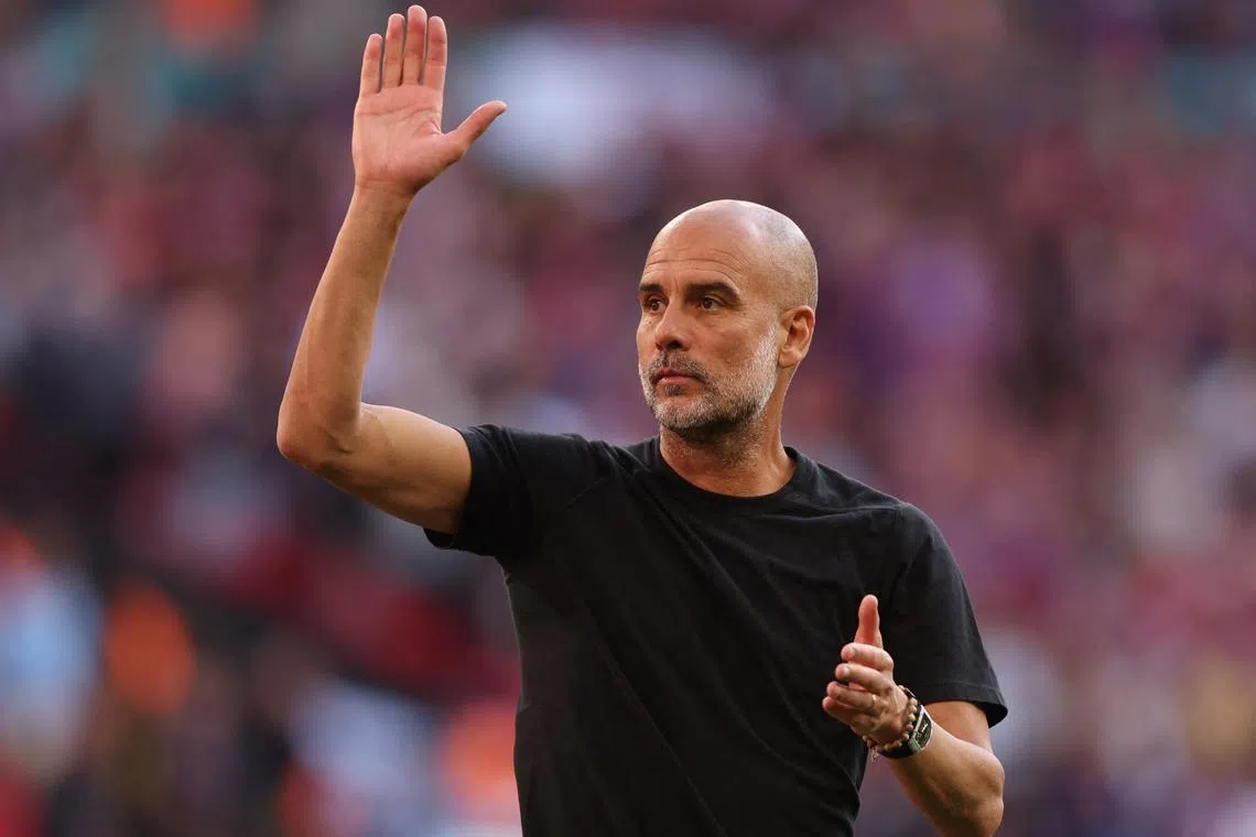 FILE PHOTO: Soccer Football - FA Cup - Final - Crystal Palace v Manchester City - Wembley Stadium, London, Britain - May 17, 2025 Manchester City manager Pep Guardiola looks dejected after the match REUTERS/David Klein/File Photo