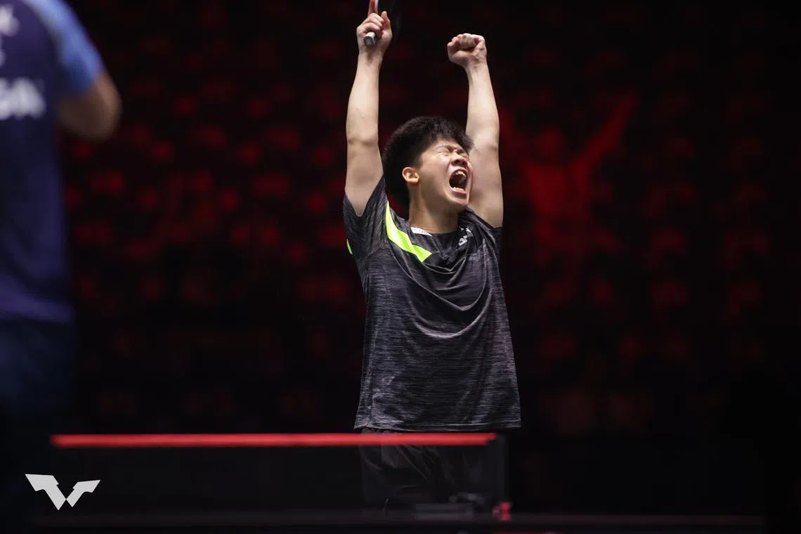 Singapore's Izaac Quek, ranked 242nd in the world, celebrates his Singapore Smash win over world No. 36 Mattias Falck on Monday.