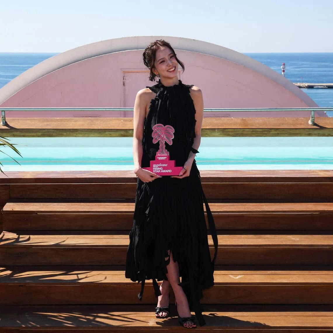 Jisoo poses with the Rising Star Award at Canneseries in southern France on April 24, 2026. 