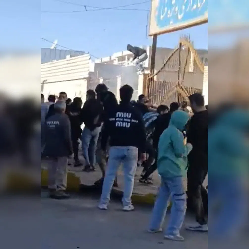 A screenshot from an online video said to show protesters storming the governor’s office in Fasa, in south-central Iran.