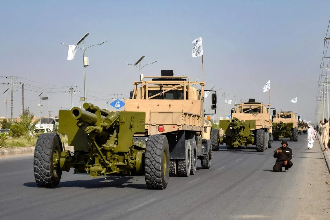 The Taliban’s armed forces towed Soviet-era tanks and artillery pieces through the former US air base in Bagram.