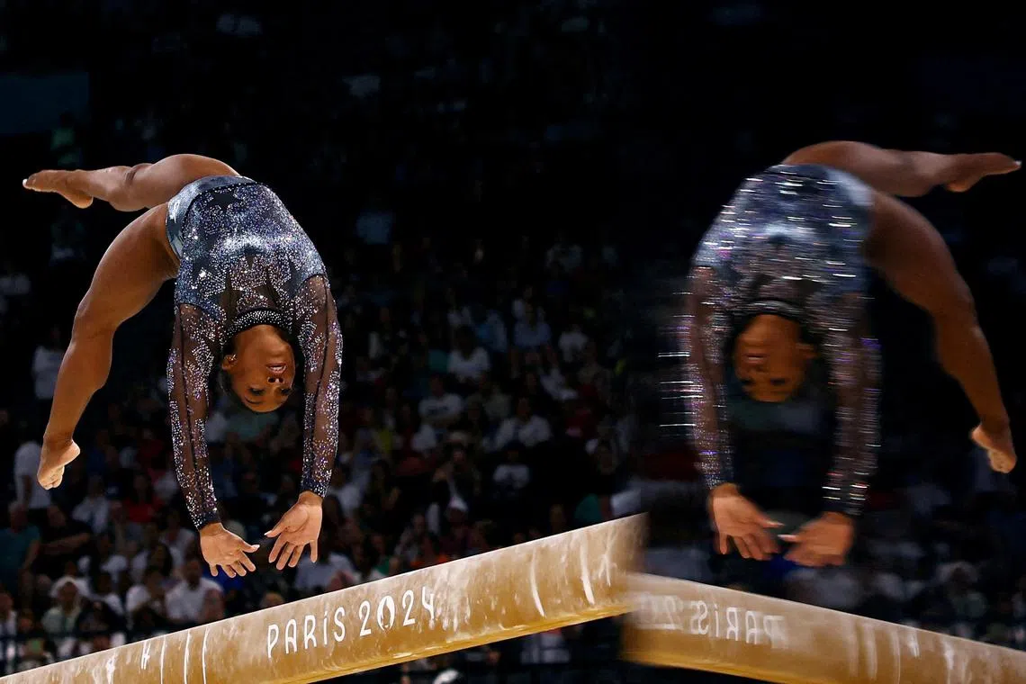 FILE PHOTO: Paris 2024 Olympics - Artistic Gymnastics - Women's Qualification - Subdivision 2 - Bercy Arena, Paris, France - July 28, 2024. Simone Biles of United States in action on the Balance Beam. REUTERS/Hannah Mckay/File Photo