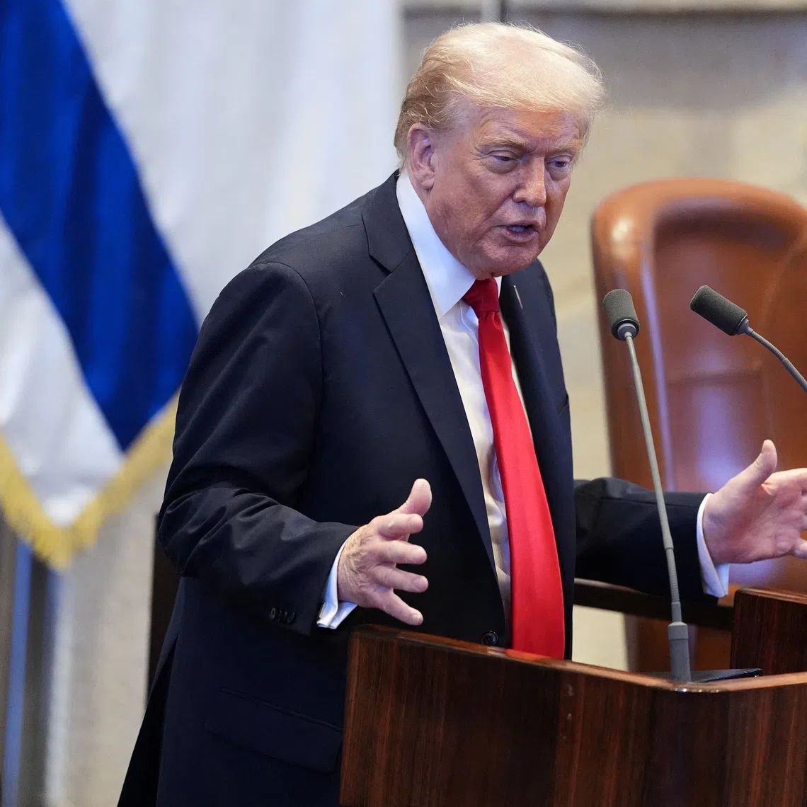 President Donald Trump speaks to the Knesset, Israel's parliament, Monday, Oct. 13, 2025, in Jerusalem.     Evan Vucci/Pool via REUTERS