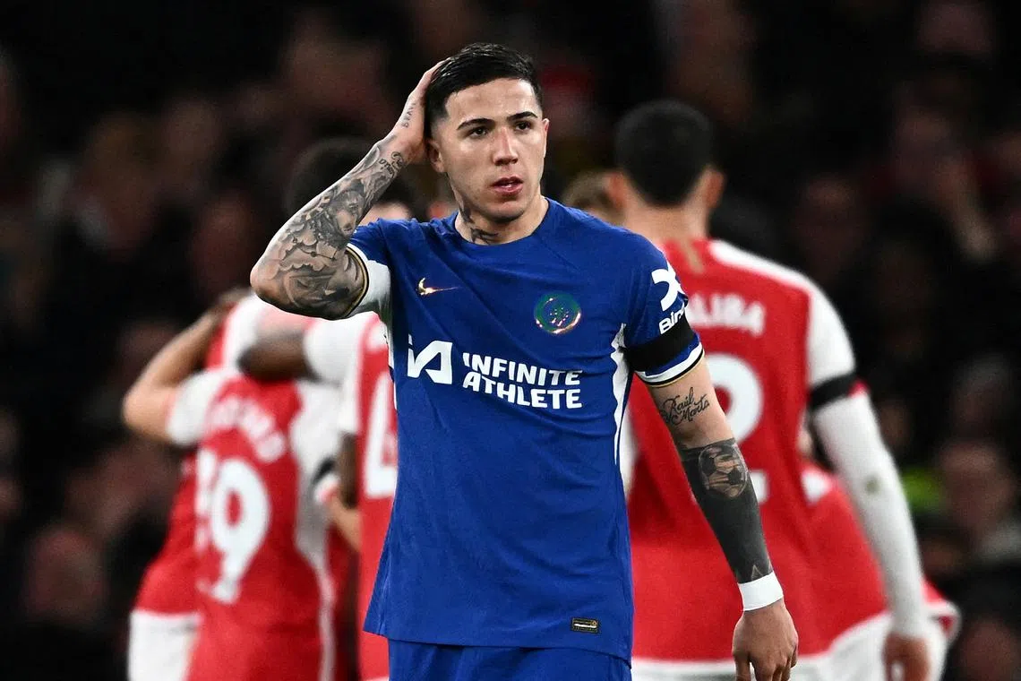 FILE PHOTO: Soccer Football - Premier League - Arsenal v Chelsea - Emirates Stadium, London, Britain - April 23, 2024 Chelsea's Enzo Fernandez looks dejected after Arsenal's Kai Havertz scores their fourth goal REUTERS/Dylan Martinez