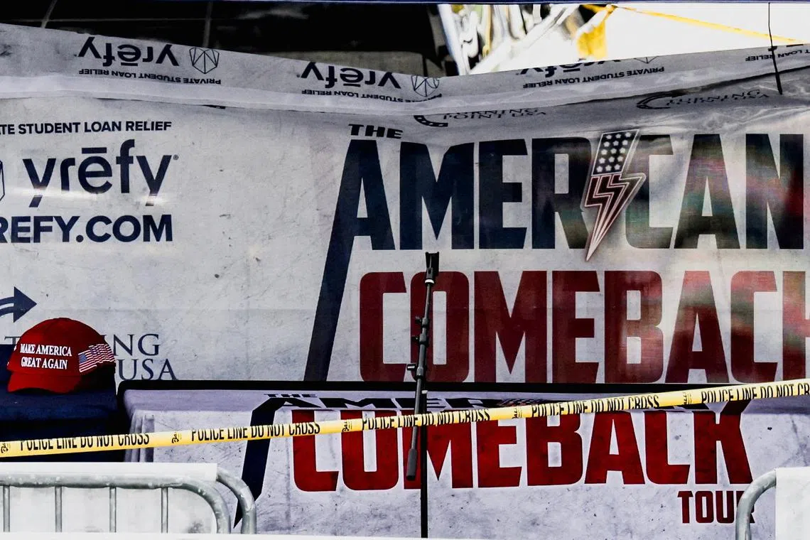 A Make America Great Again hat sits at a table inside a tent bearing the slogan 'The American Comeback Tour', cordoned off after U.S. right-wing activist, commentator, Charlie Kirk, an ally of U.S. President Donald Trump, was fatally shot during an event at Utah Valley University, in Orem, Utah, U.S. September 10, 2025.  REUTERS/Jim Urquhart