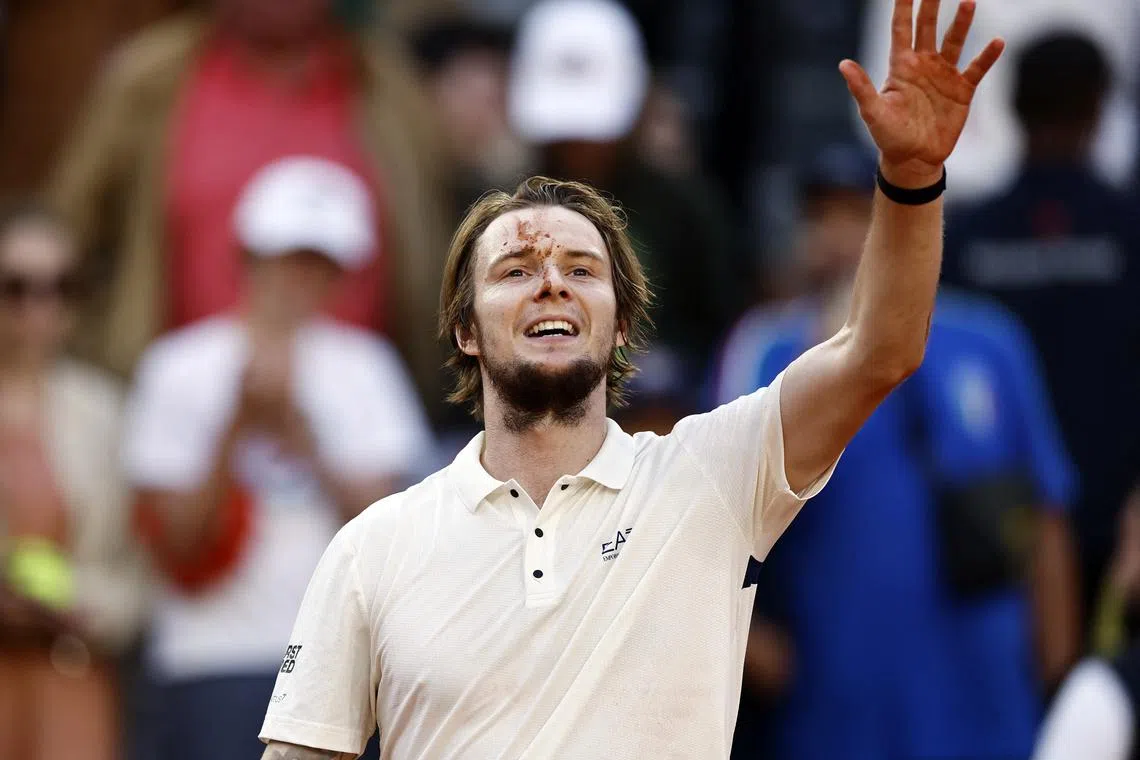 FILE PHOTO: Tennis - French Open - Roland Garros, Paris, France - June 2, 2025 Kazakhstan's Alexander Bublik celebrates winning his fourth round match against Britain's Jack Draper REUTERS/Stephanie Lecocq/File Photo