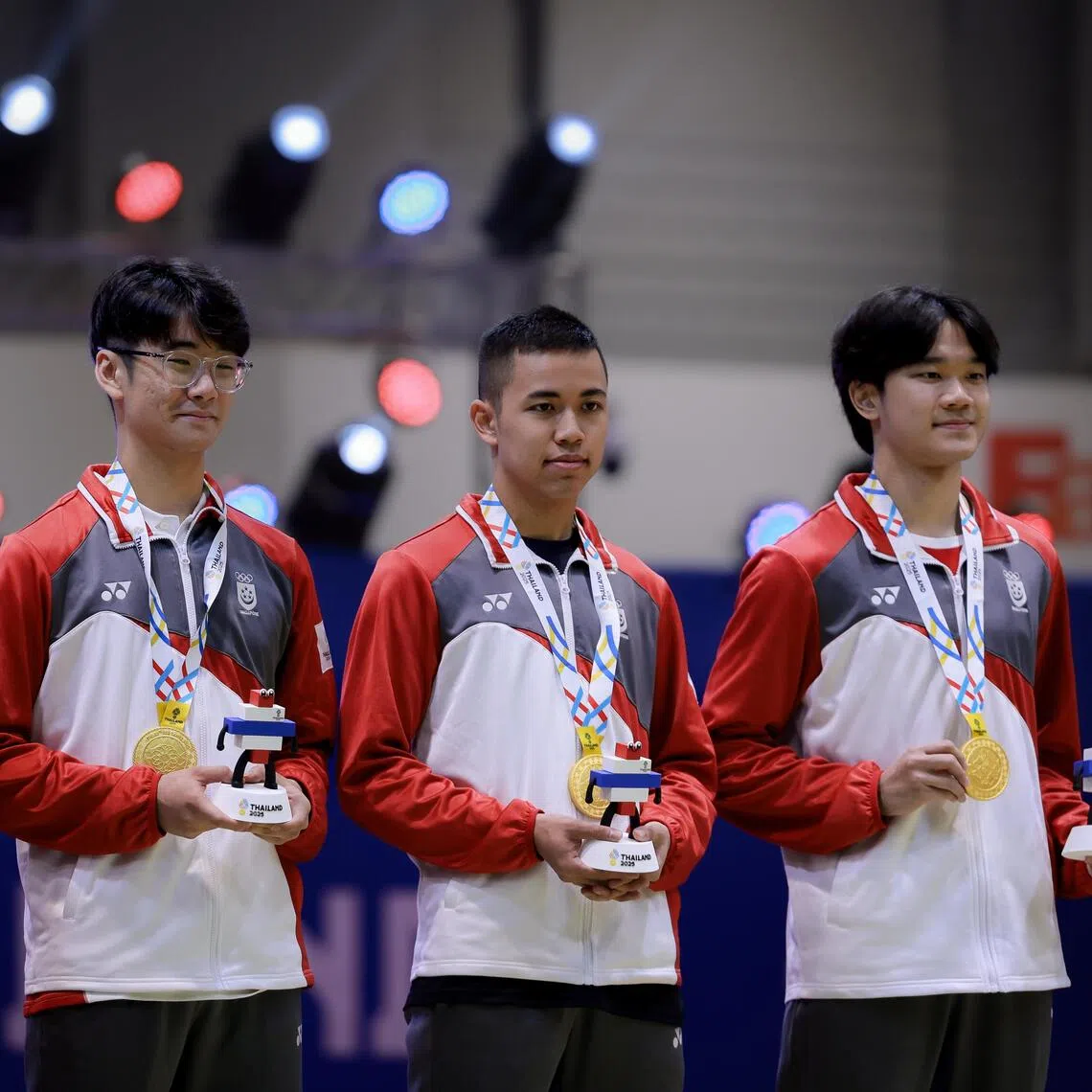 (From left) Raphael Tan, Julian Soh, Samuel Robson and Jonathan Lim with their gold medals.