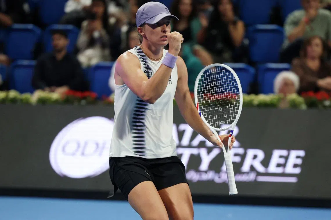 Tennis - WTA 1000 - Qatar Open - International Tennis and Squash complex, Doha, Qatar - February 12, 2026 Poland's Iga Swiatek reacts during her quarter final match against Greece's Maria Sakkari REUTERS/Mohammed Salem
