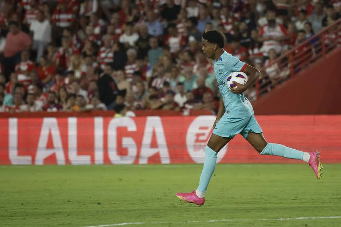 FILE PHOTO:Soccer Football - LaLiga - Granada v FC Barcelona - Nuevo Estadio de Los Carmenes, Granada, Spain - October 8, 2023 FC Barcelona's Lamine Yamal celebrates scoring their first goal REUTERS/Jon Nazca/File Photo