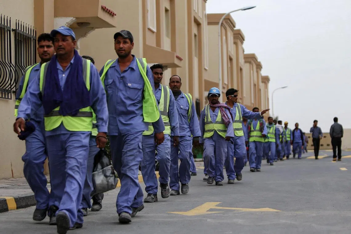 Foreign workers on the construction site of the Al Janoub Stadium in 2015, one of the venues for the Qatar World Cup. Qatar has rejected calls for a compensation fund for workers killed or injured during World Cup preparations.