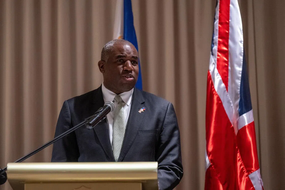 FILE PHOTO: British Foreign Minister David Lammy speaks during the joint press conference with Philippine Secretary of Foreign Affairs Enrique Manalo, in Taguig City, Metro Manila, Philippines, March 8, 2025.   Jam Sta Rosa/Pool via REUTERS/File Photo